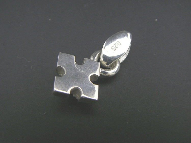 Pyramid cross pendant