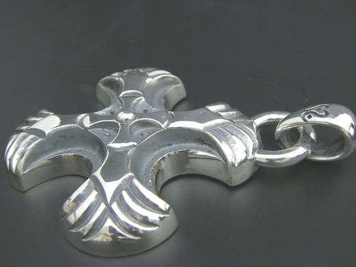Triple cross pendant