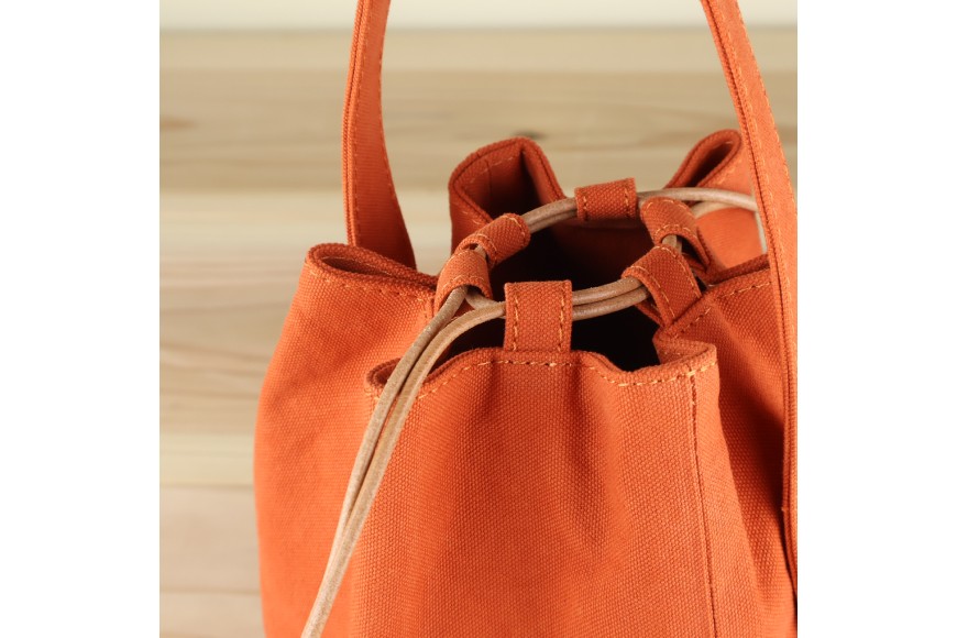 丸底の巾着バッグ　L　オレンジ / アトリエSASSA / 富山県 朝日町 [34310191]