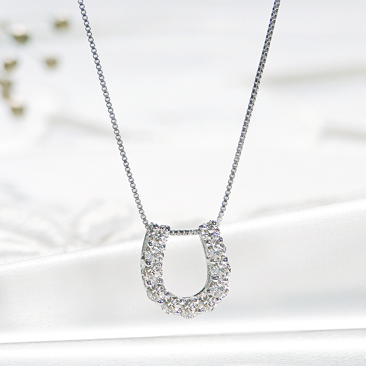 ＜ 甲府ジュエリー ＞Pt ダイヤ馬蹄0.20ct　PN　325714