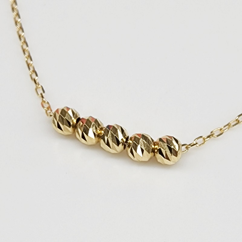 ＜ 甲府ジュエリー ＞K18 イエローゴールド ムーブ ハニーカットボール 5粒 ネックレス BNC-0245